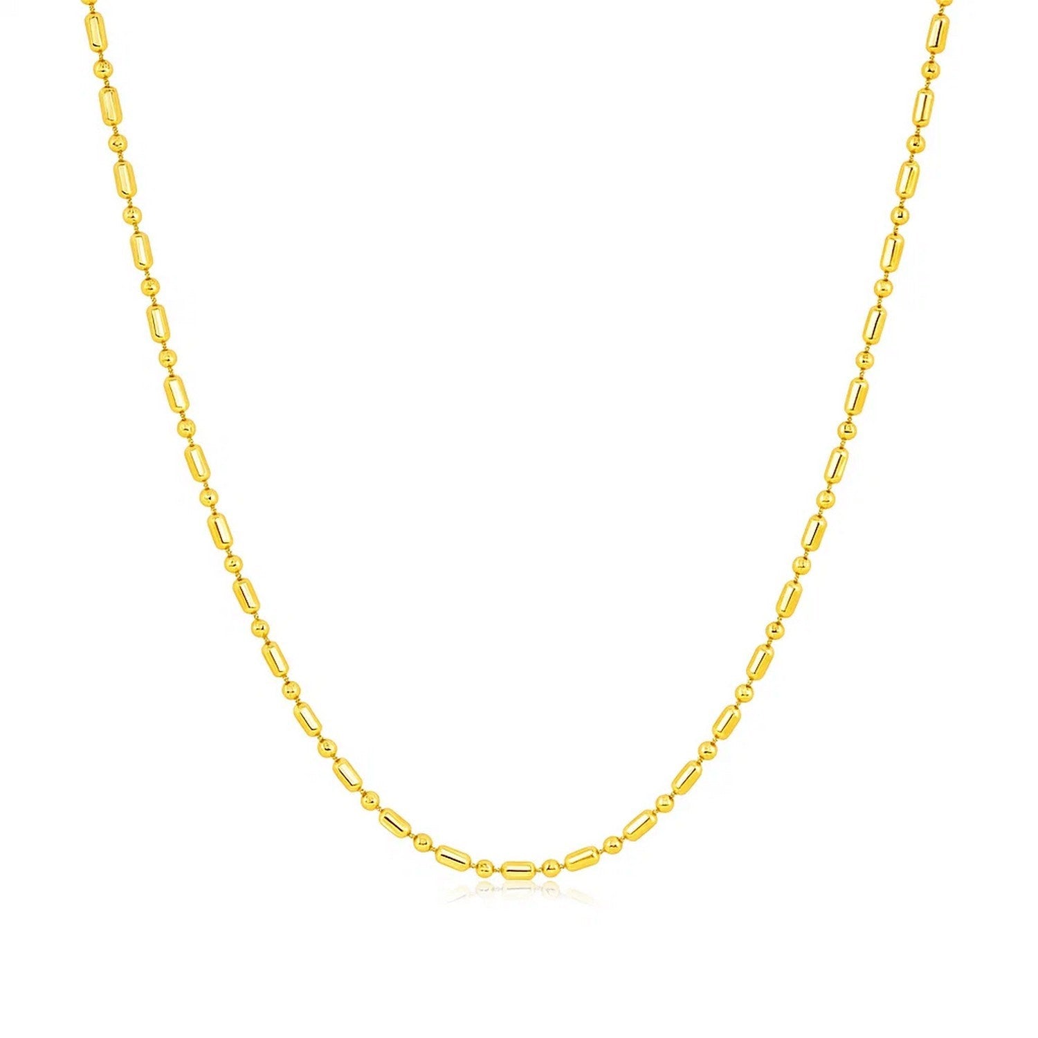 14k Yellow Gold Diamond-Cut Alternating Bead Chain (1.10 mm) in a sleek high-contrast midnight luxury editorial style