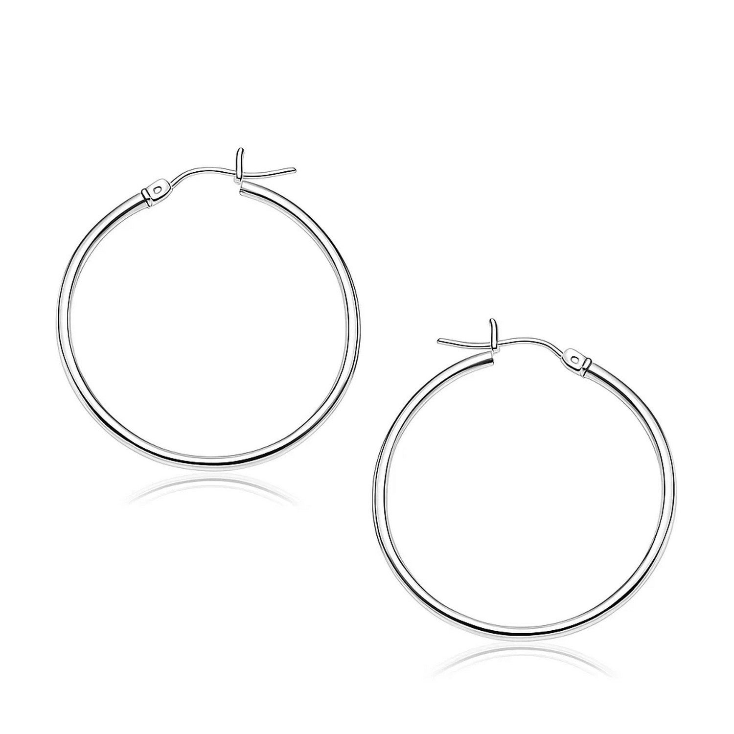 14k White Gold Polished Hoop Earrings (2x30mm) in a sleek high-contrast midnight luxury editorial style
