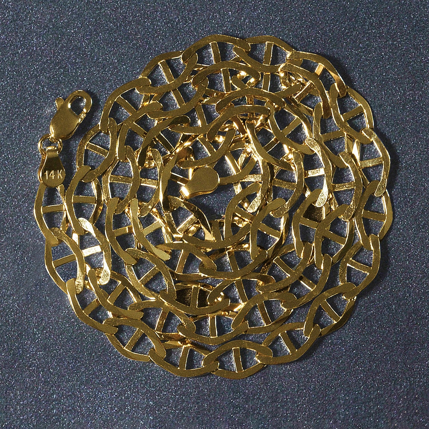 Peelerie jewelry piece in midnight luxury editorial product photo, high-contrast studio lighting