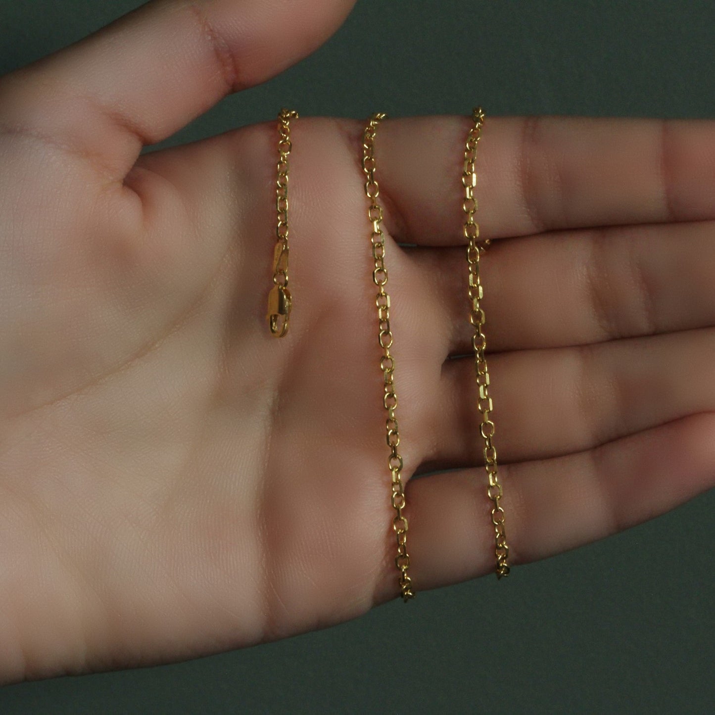 Peelerie jewelry piece in midnight luxury editorial product photo, high-contrast studio lighting