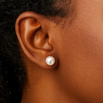 14k yellow and white gold stud earrings set with pearl