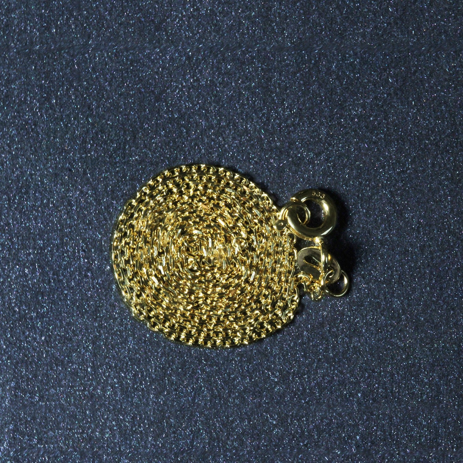 Peelerie jewelry piece in midnight luxury editorial product photo, high-contrast studio lighting