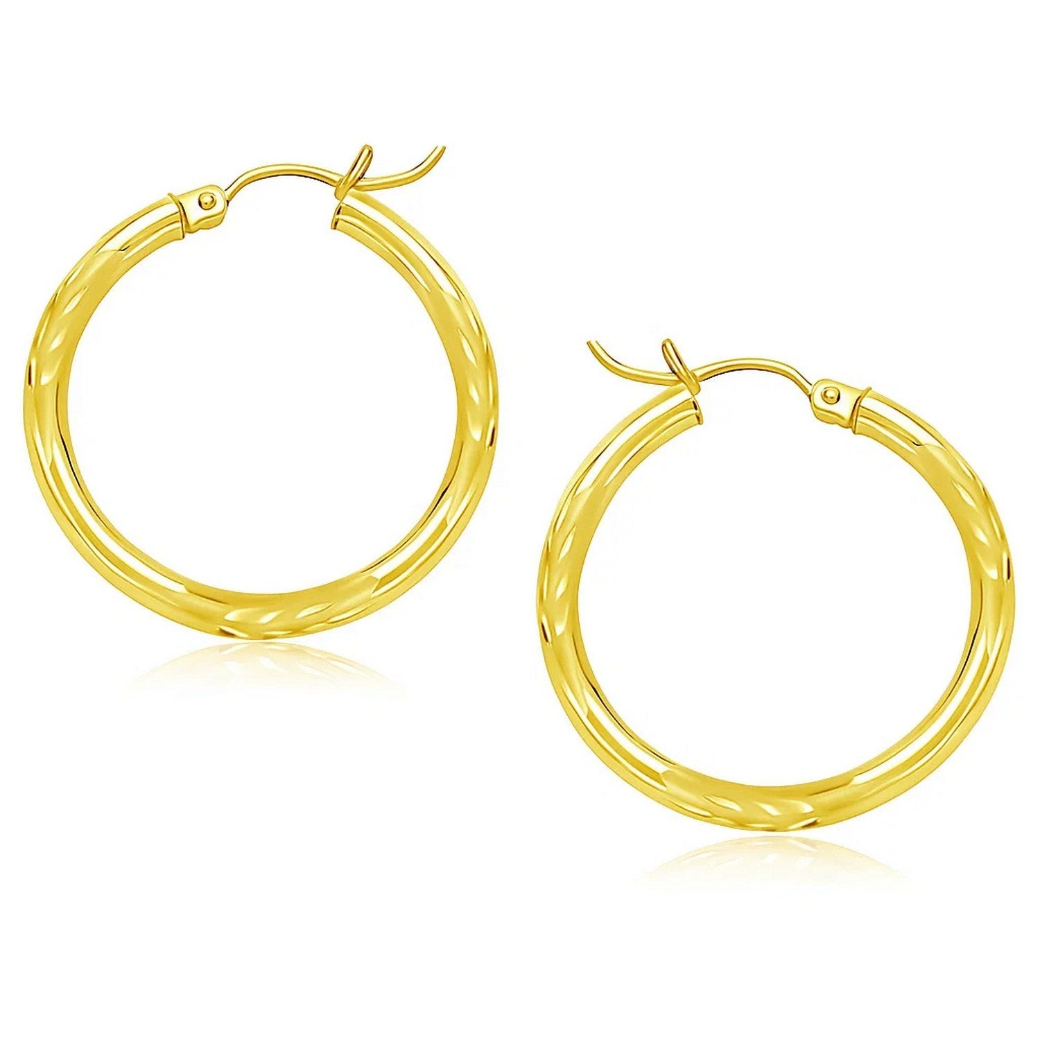 14k Yellow Gold Diamond Cut Hoop Earrings (3x25mm) in a sleek high-contrast midnight luxury editorial style