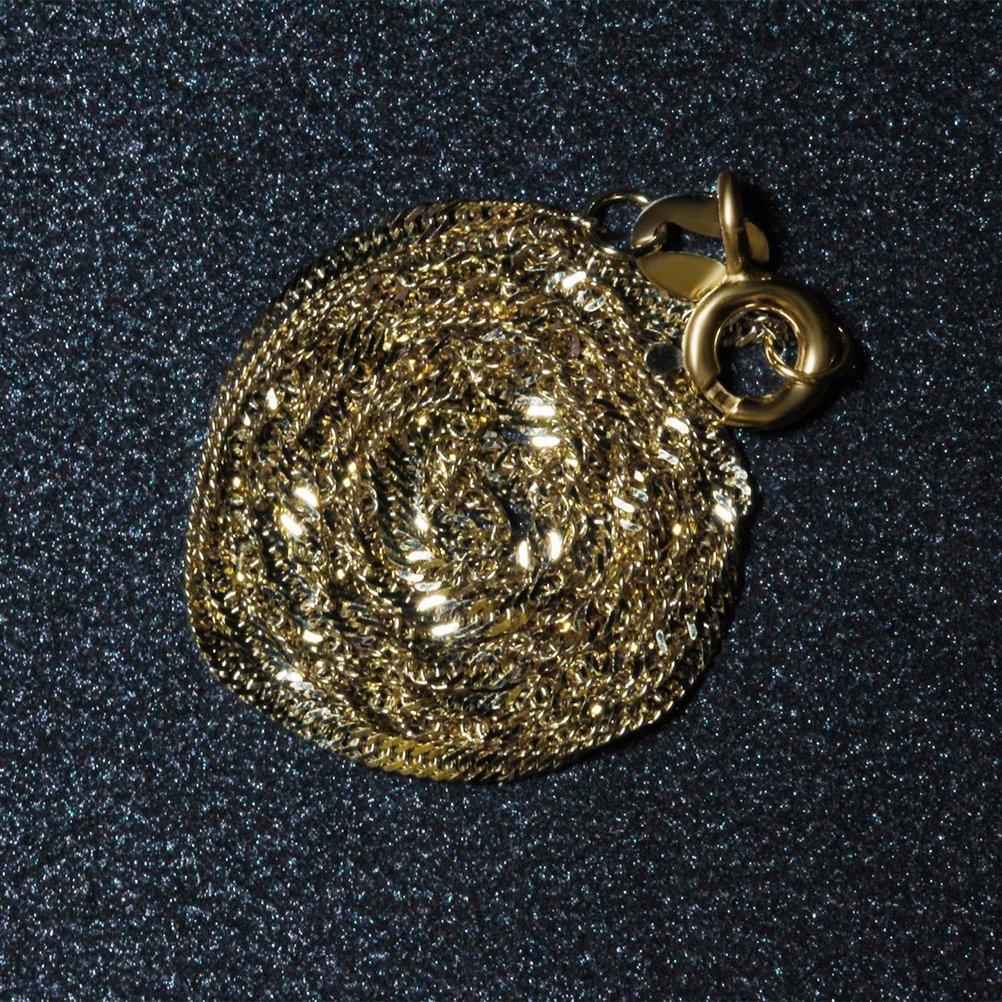 Peelerie jewelry piece in midnight luxury editorial product photo, high-contrast studio lighting