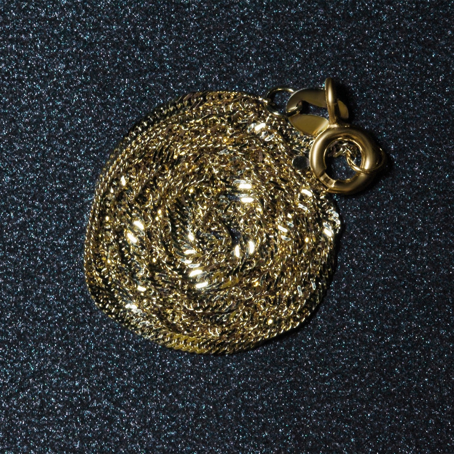 Peelerie jewelry piece in midnight luxury editorial product photo, high-contrast studio lighting