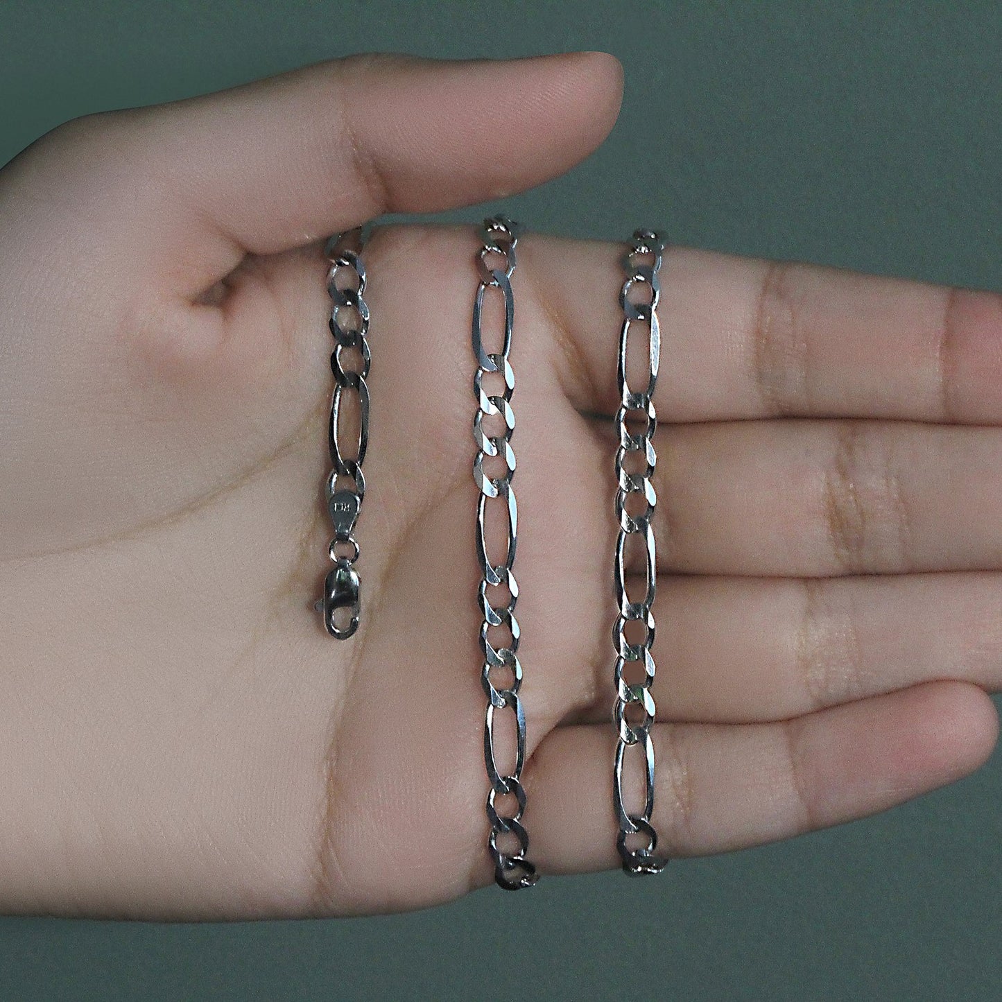 Peelerie jewelry piece in midnight luxury editorial product photo, high-contrast studio lighting