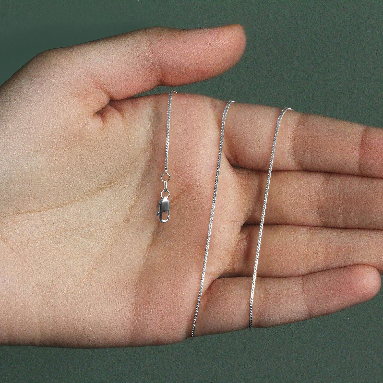 Peelerie jewelry piece in midnight luxury editorial product photo, high-contrast studio lighting