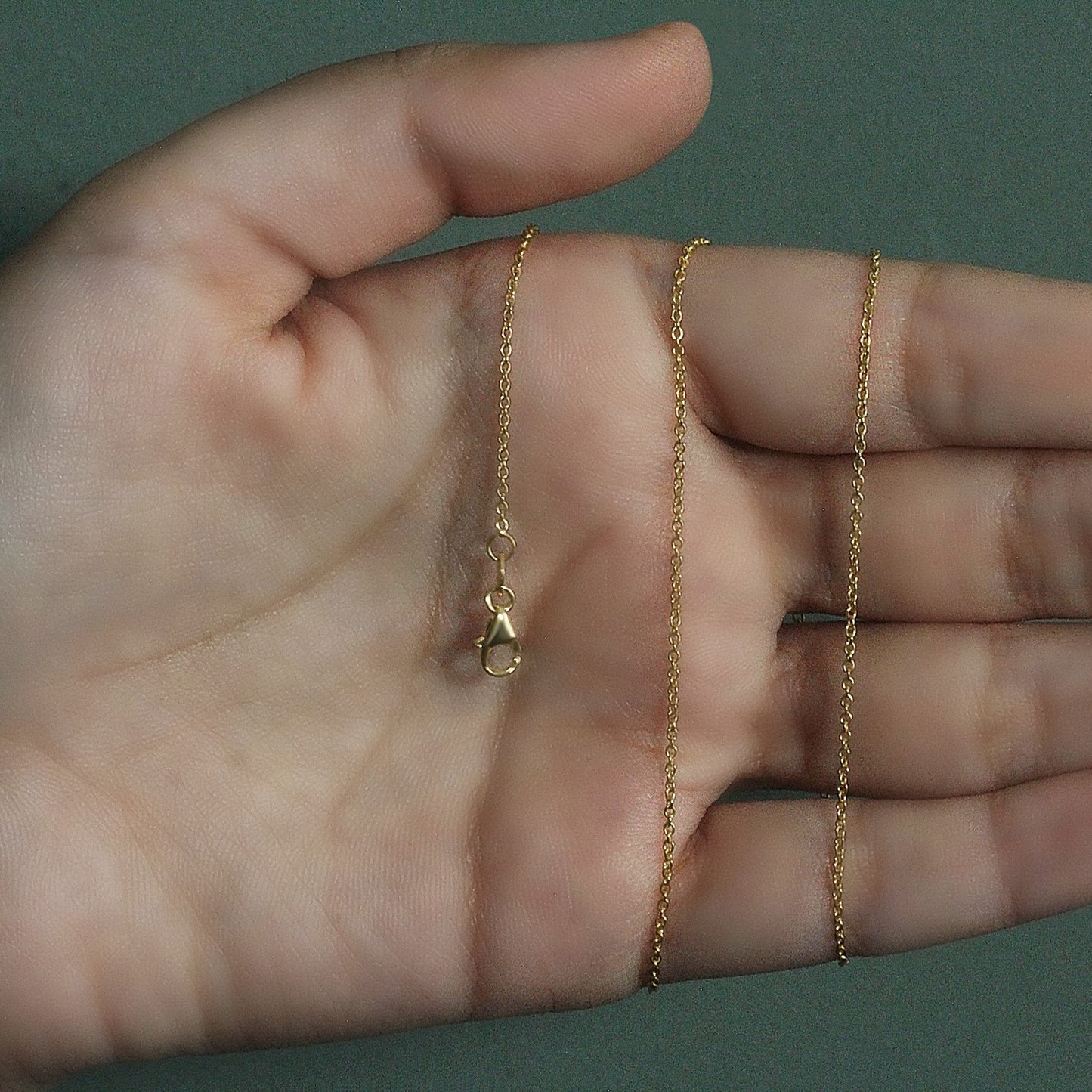 Peelerie jewelry piece in midnight luxury editorial product photo, high-contrast studio lighting