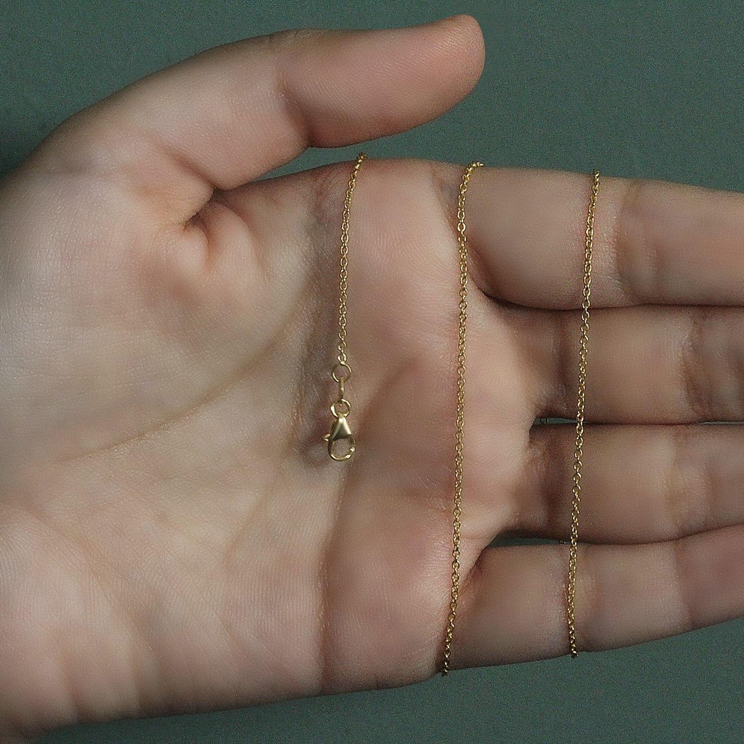 Peelerie jewelry piece in midnight luxury editorial product photo, high-contrast studio lighting