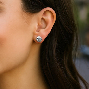 Peelerie jewelry piece in midnight luxury editorial product photo, high-contrast studio lighting