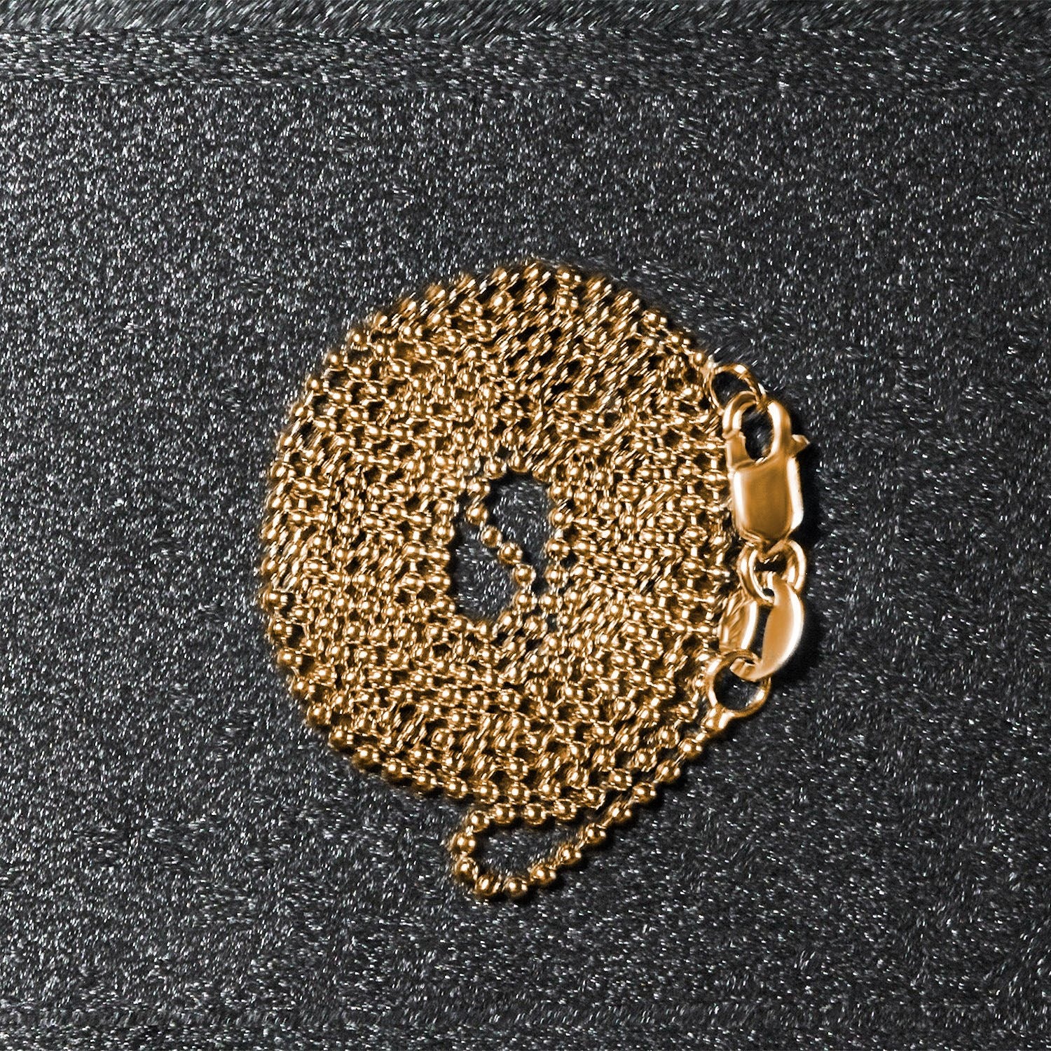 Peelerie jewelry piece in midnight luxury editorial product photo, high-contrast studio lighting