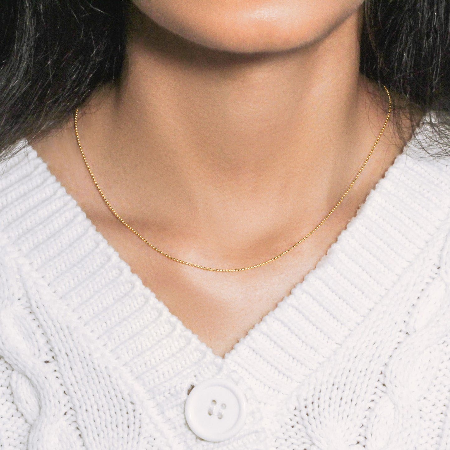 Peelerie jewelry piece in midnight luxury editorial product photo, high-contrast studio lighting