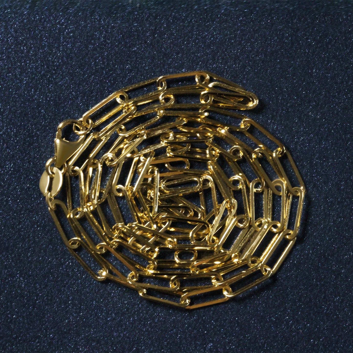 Peelerie jewelry piece in midnight luxury editorial product photo, high-contrast studio lighting