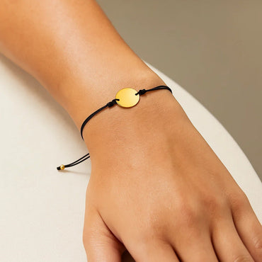 9 1/4 inch Black Cord Adjustable Bracelet with 14k Yellow Gold Circle