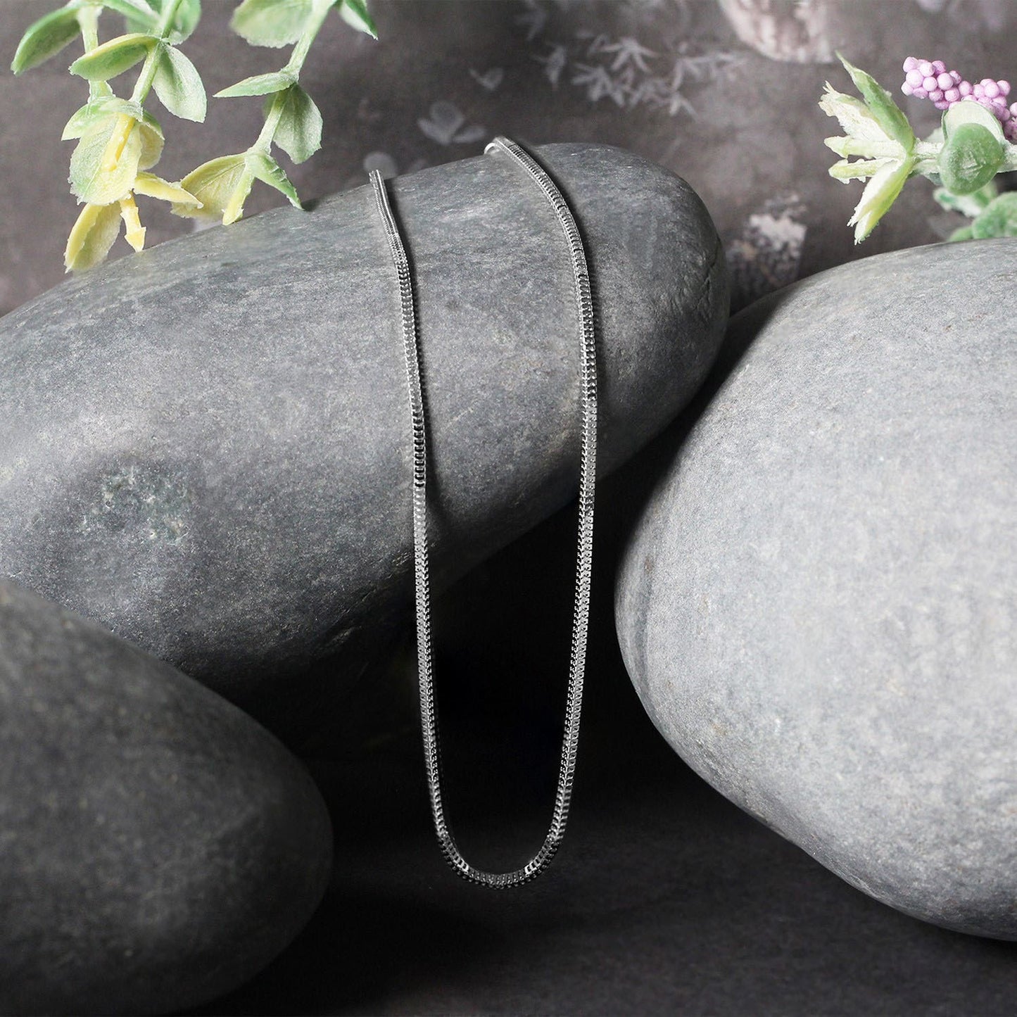 Peelerie jewelry piece in midnight luxury editorial product photo, high-contrast studio lighting