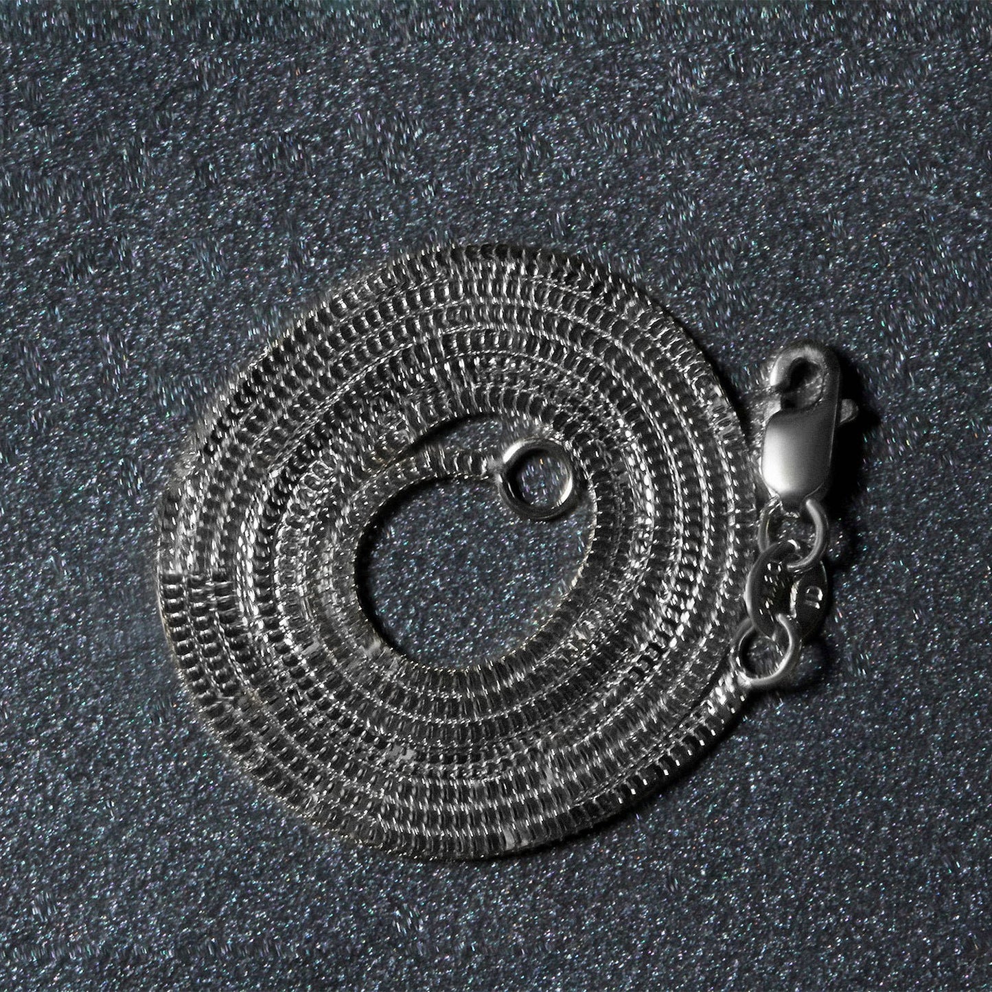 Peelerie jewelry piece in midnight luxury editorial product photo, high-contrast studio lighting