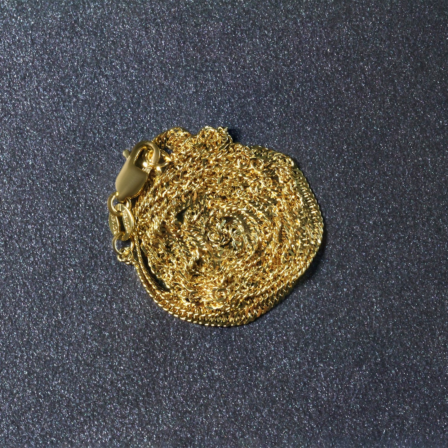 Peelerie jewelry piece in midnight luxury editorial product photo, high-contrast studio lighting