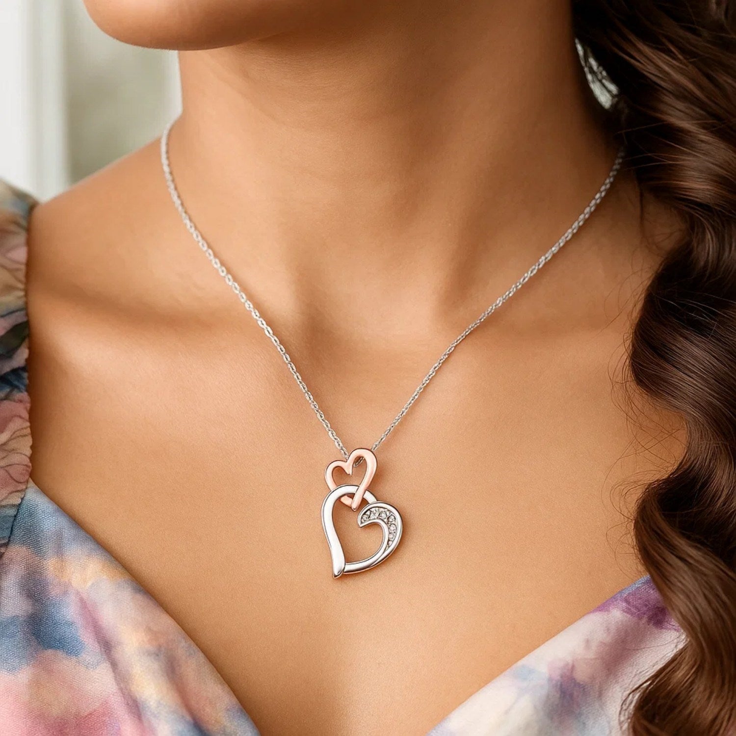 Sterling Silver Cascading Dual Heart Diamond Accented Pendant (.02 cttw) - Peelerie