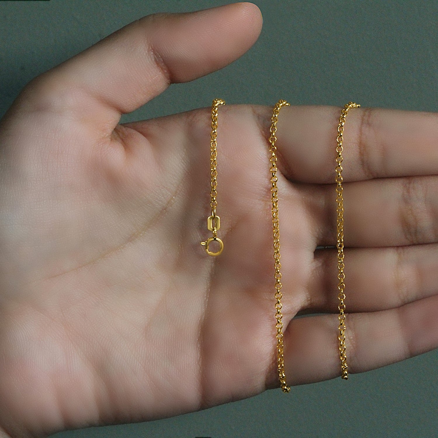 Peelerie jewelry piece in midnight luxury editorial product photo, high-contrast studio lighting