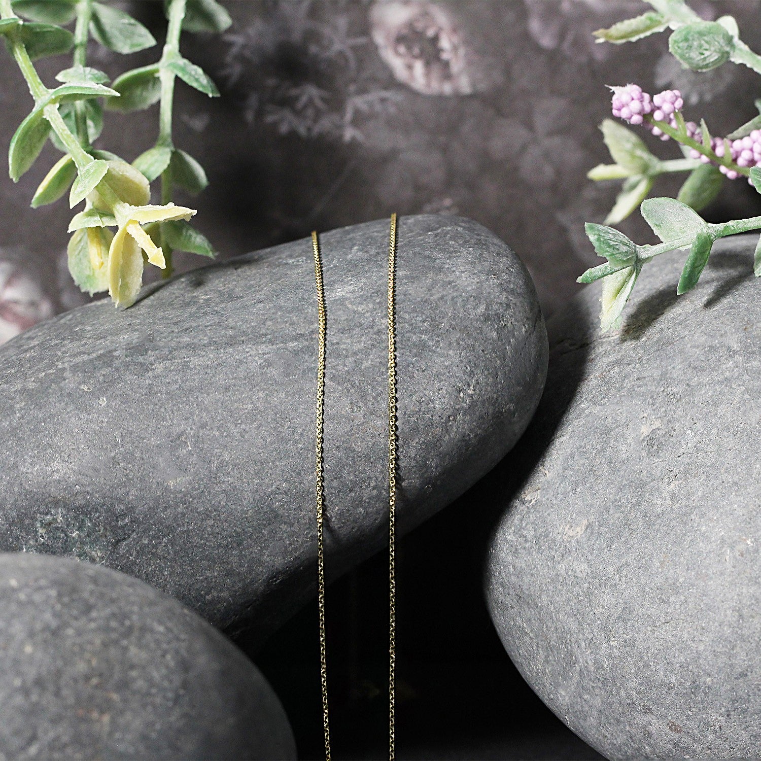 14k Yellow Gold Cable Link Chain (0.50 mm) in a sleek high-contrast midnight luxury editorial style