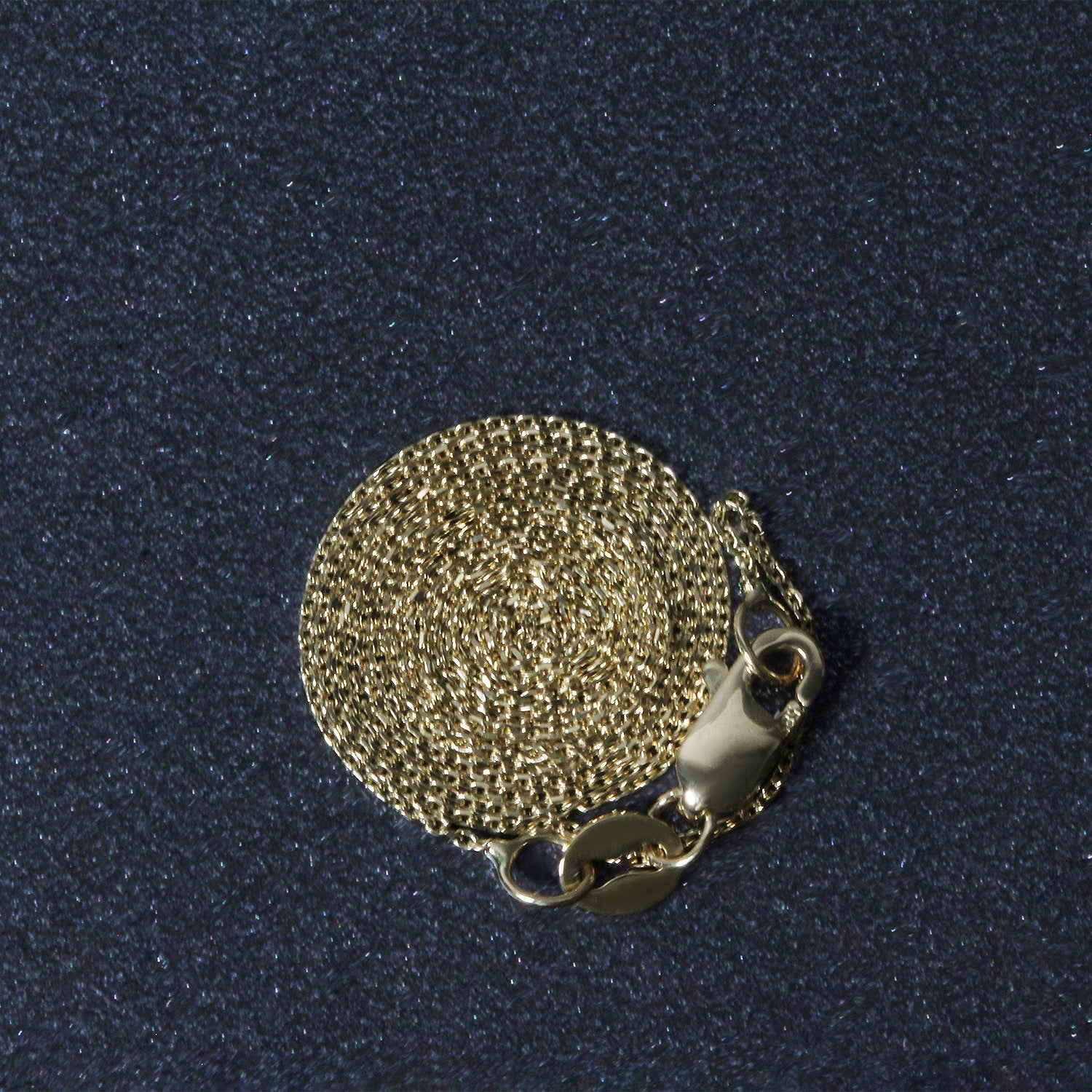 Peelerie jewelry piece in midnight luxury editorial product photo, high-contrast studio lighting