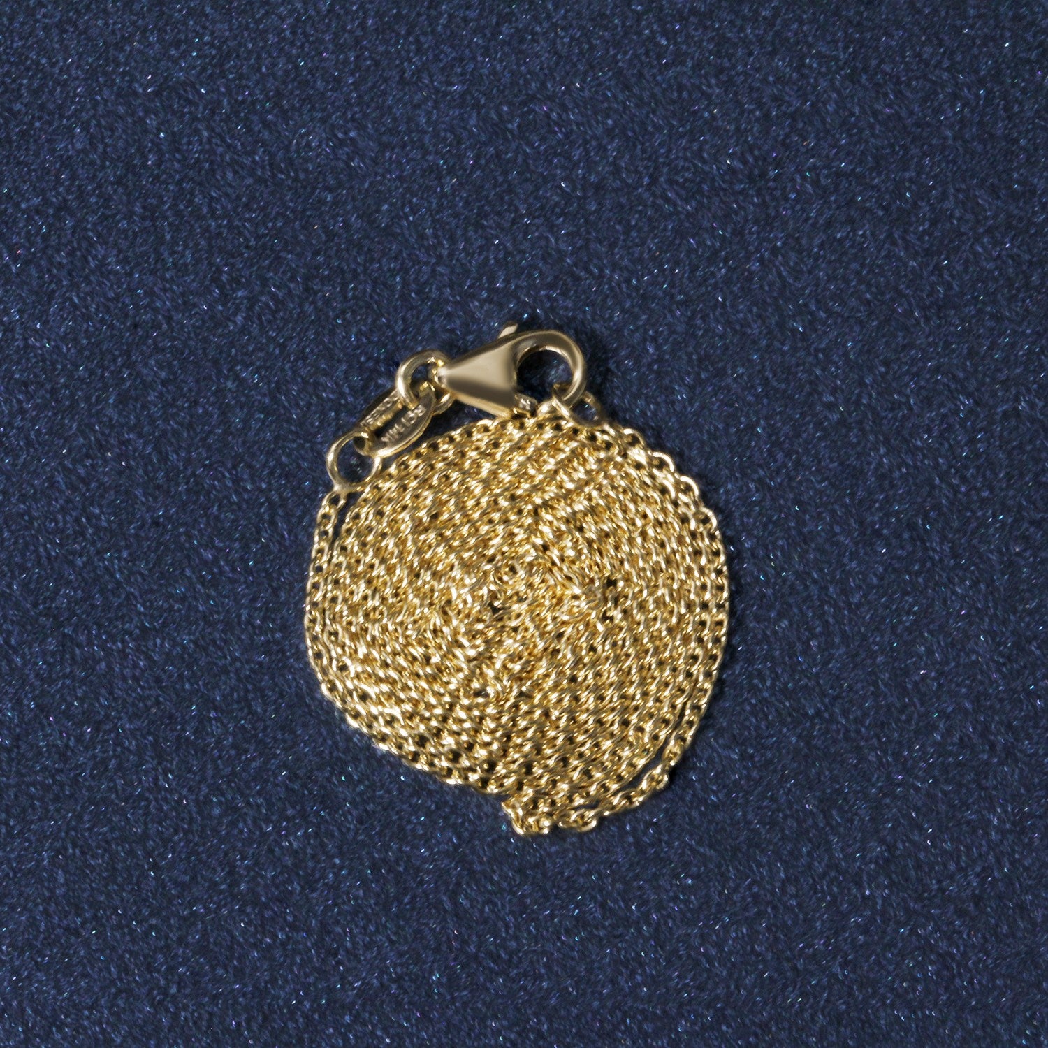 Peelerie jewelry piece in midnight luxury editorial product photo, high-contrast studio lighting