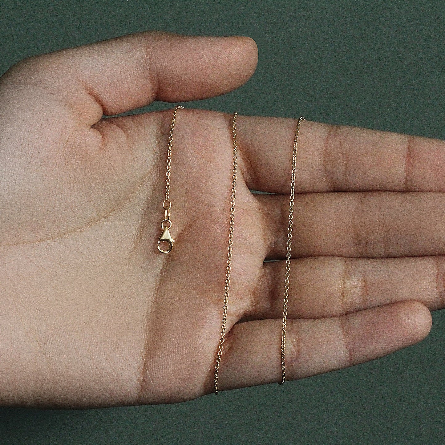 Peelerie jewelry piece in midnight luxury editorial product photo, high-contrast studio lighting