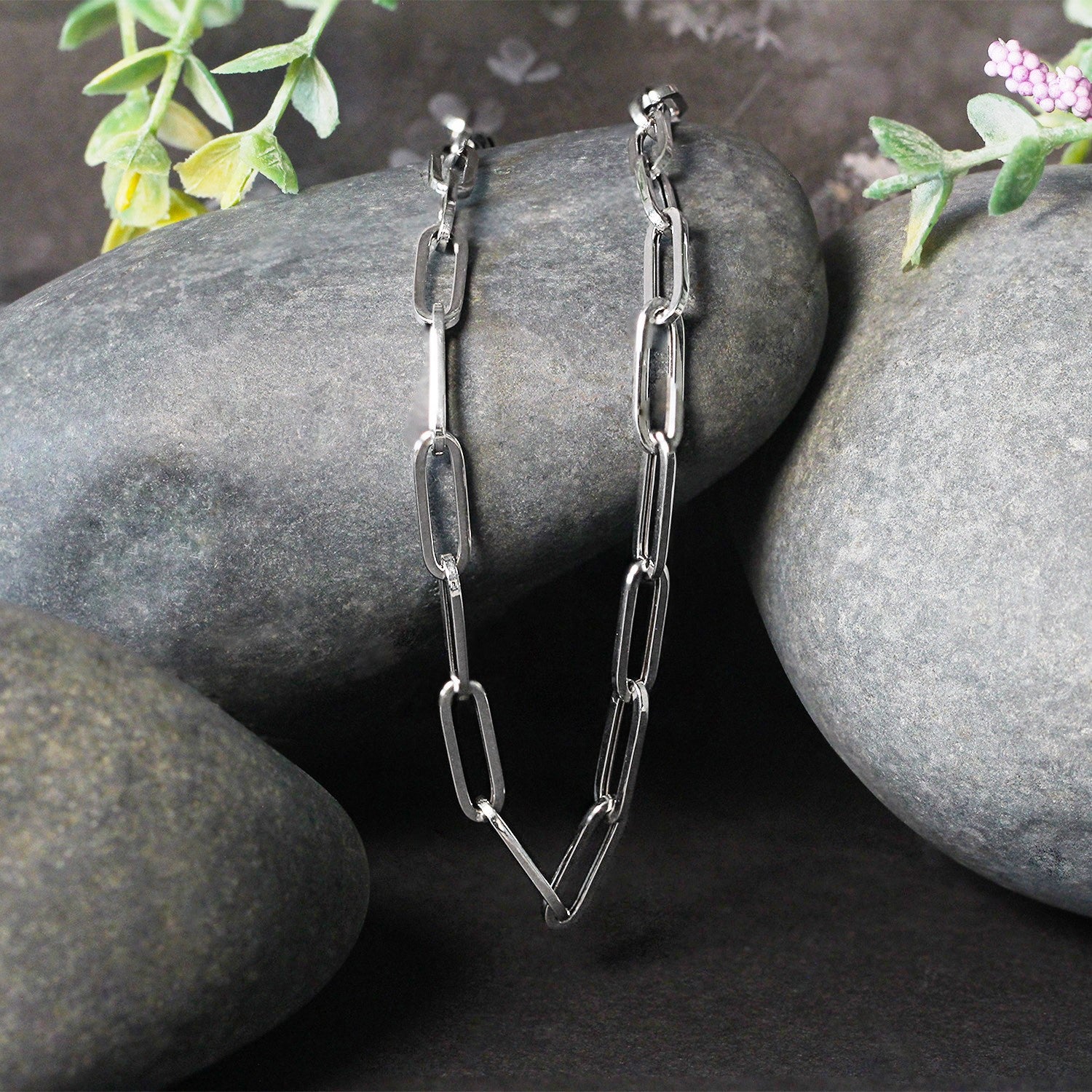 Peelerie jewelry piece in midnight luxury editorial product photo, high-contrast studio lighting