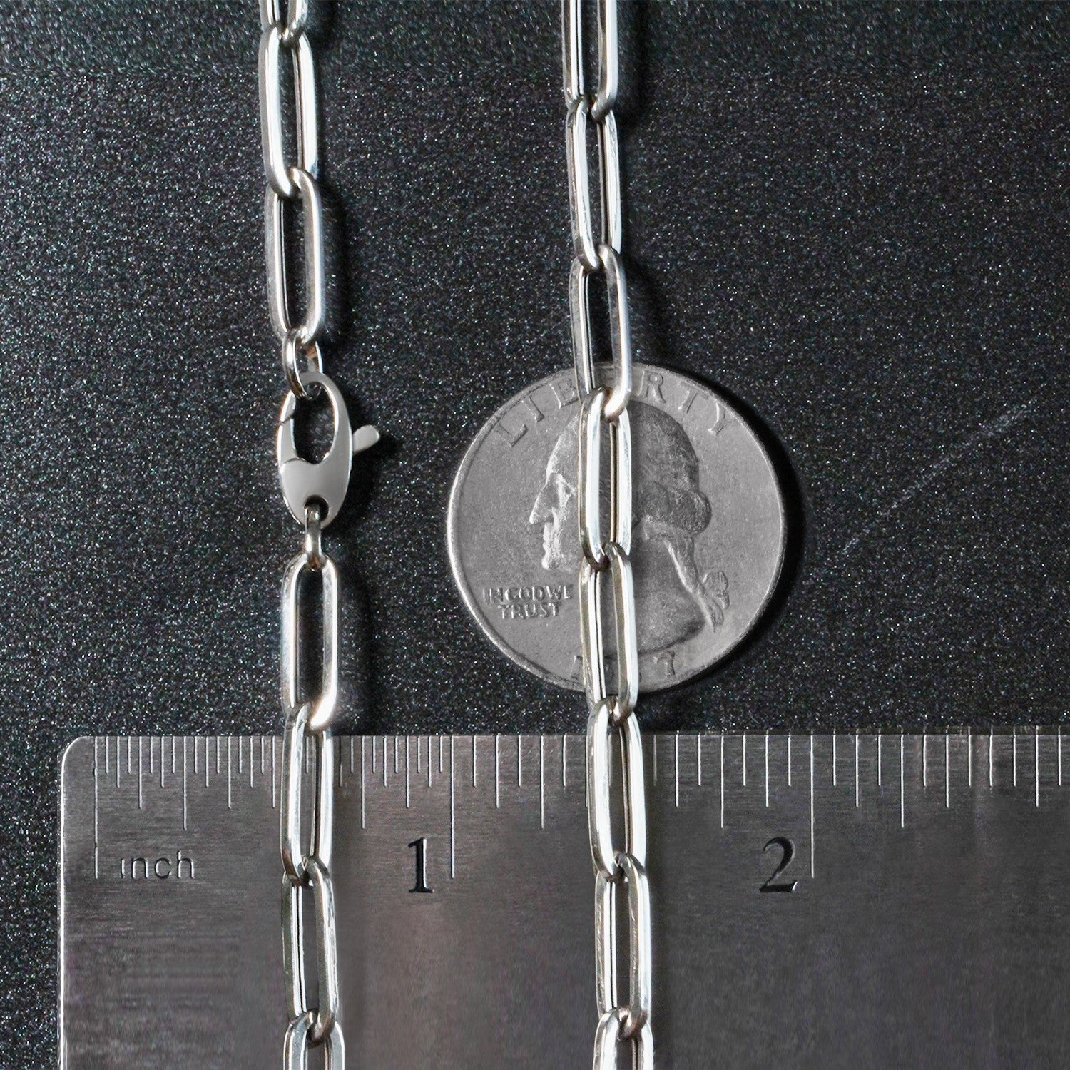 Peelerie jewelry piece in midnight luxury editorial product photo, high-contrast studio lighting