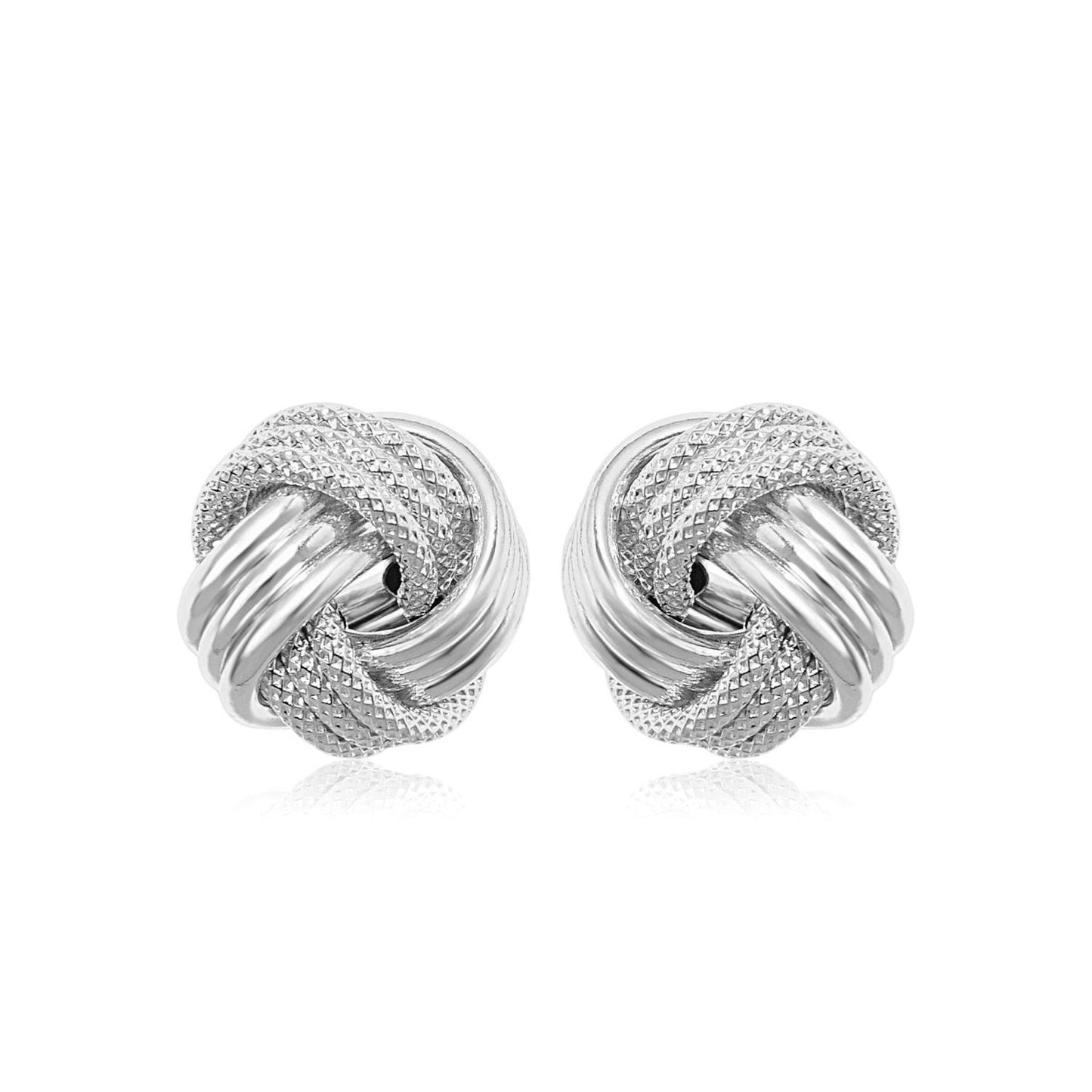 14k White Gold Love Knot with Ridge Texture Earrings in a sleek high-contrast midnight luxury editorial style