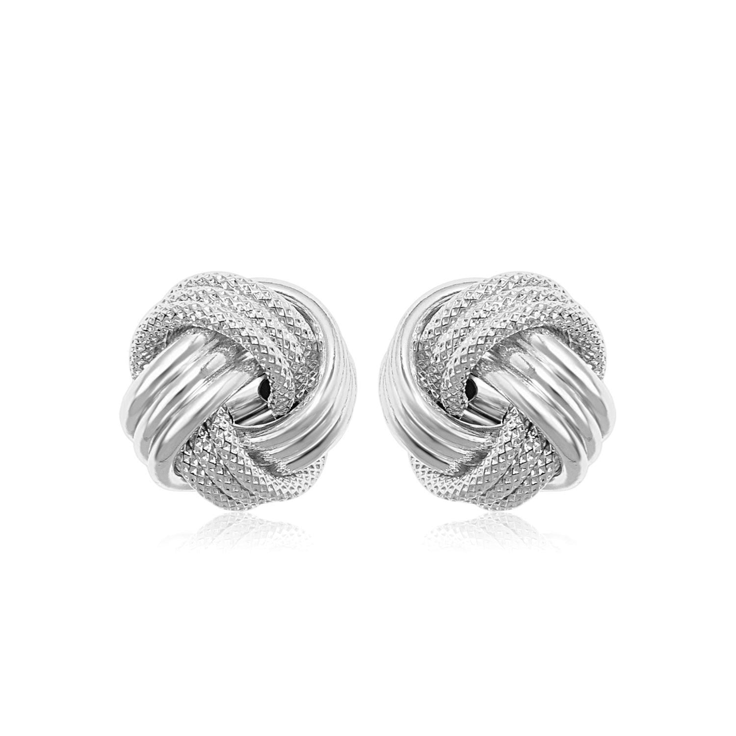 14k White Gold Love Knot with Ridge Texture Earrings in a sleek high-contrast midnight luxury editorial style