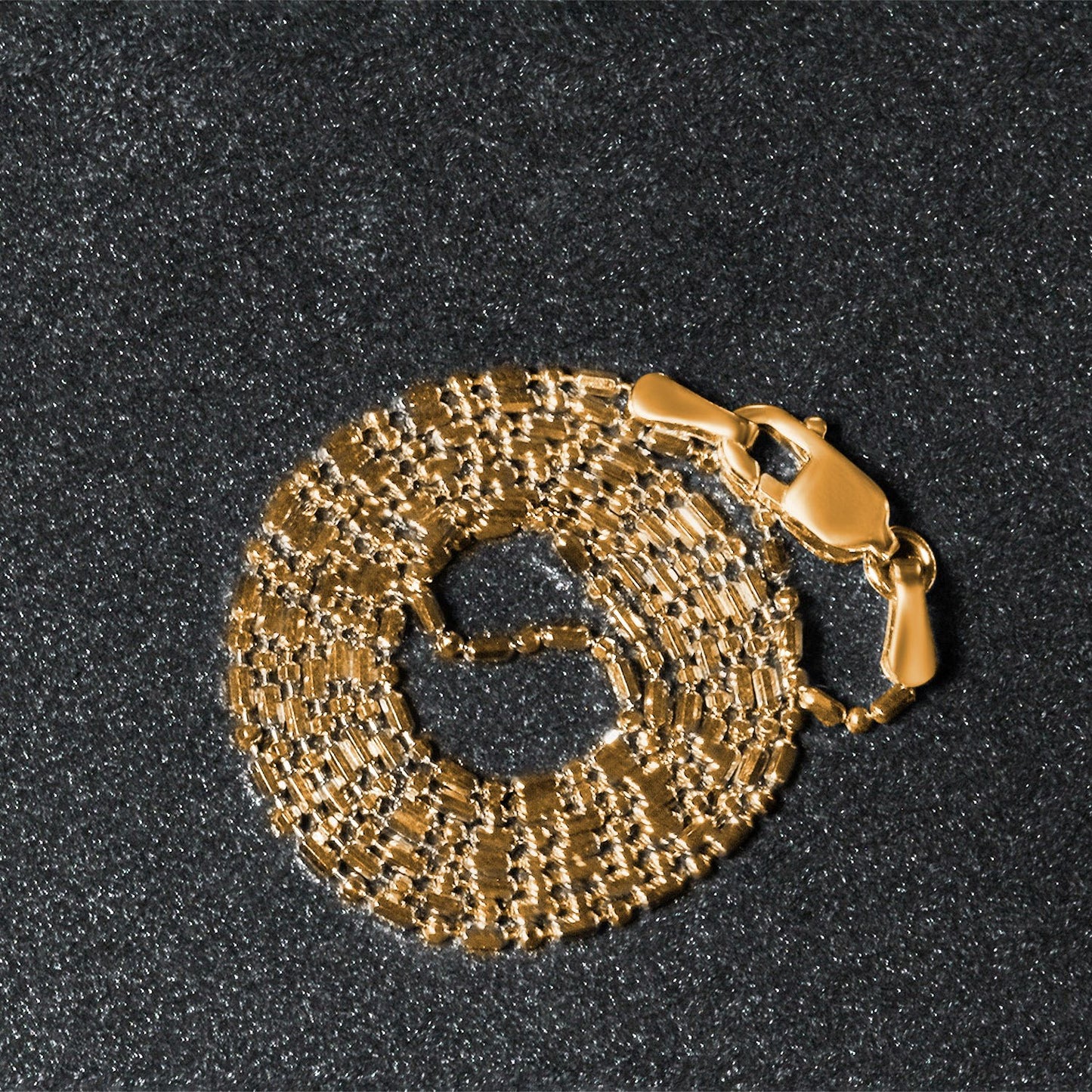 Peelerie jewelry piece in midnight luxury editorial product photo, high-contrast studio lighting