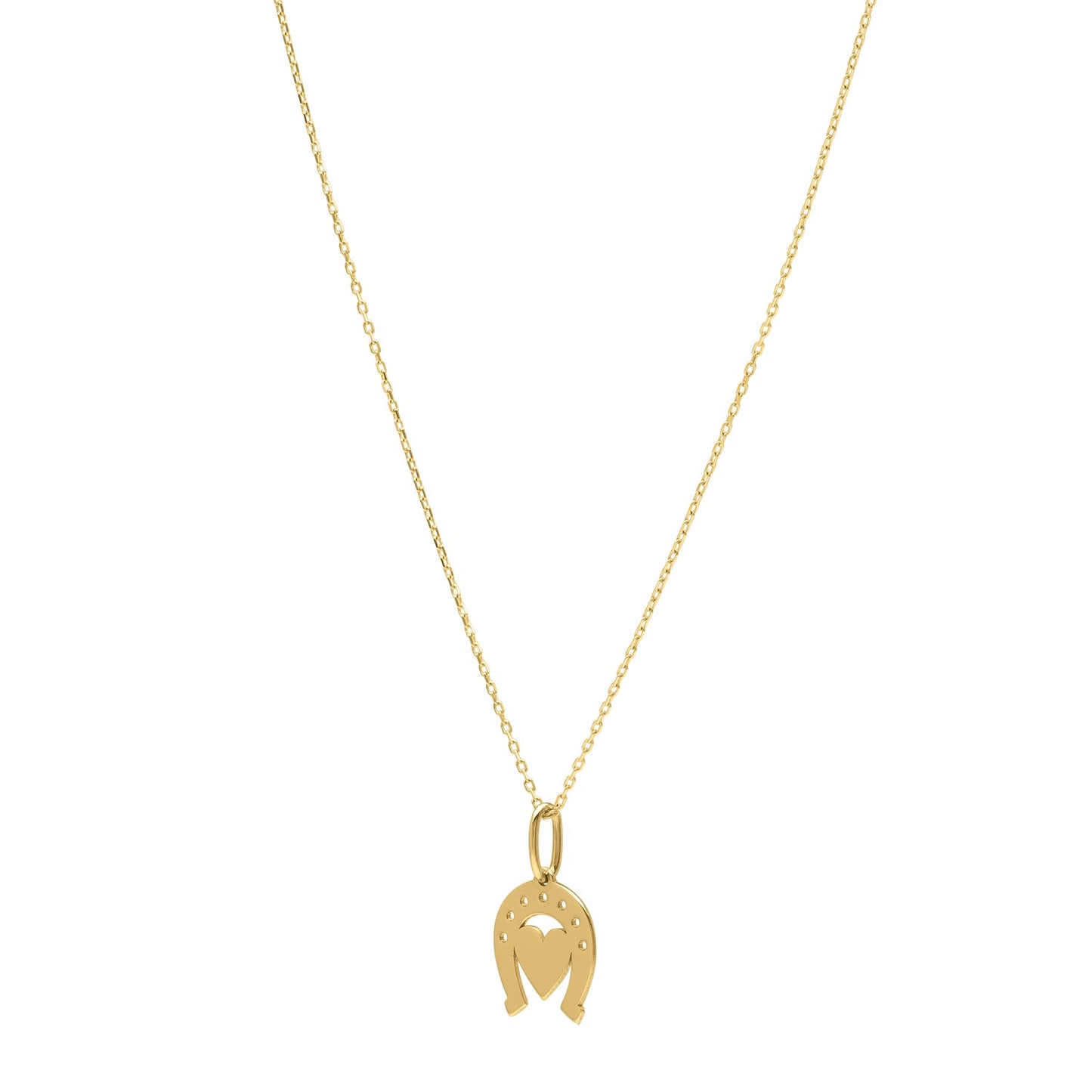 Heart and Horse Necklace in 14K Yellow Gold in a sleek high-contrast midnight luxury editorial style