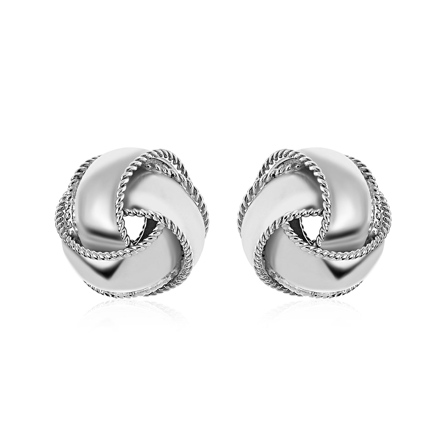 Textured and Polished Love Knot Earrings in Sterling Silver(13mm) in a sleek high-contrast midnight luxury editorial style