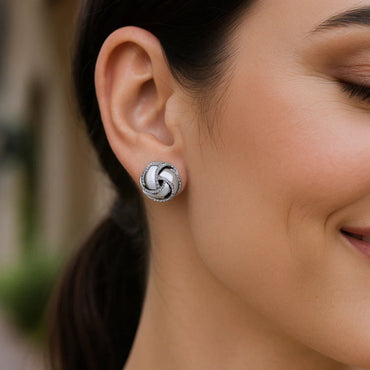 Peelerie jewelry piece in midnight luxury editorial product photo, high-contrast studio lighting