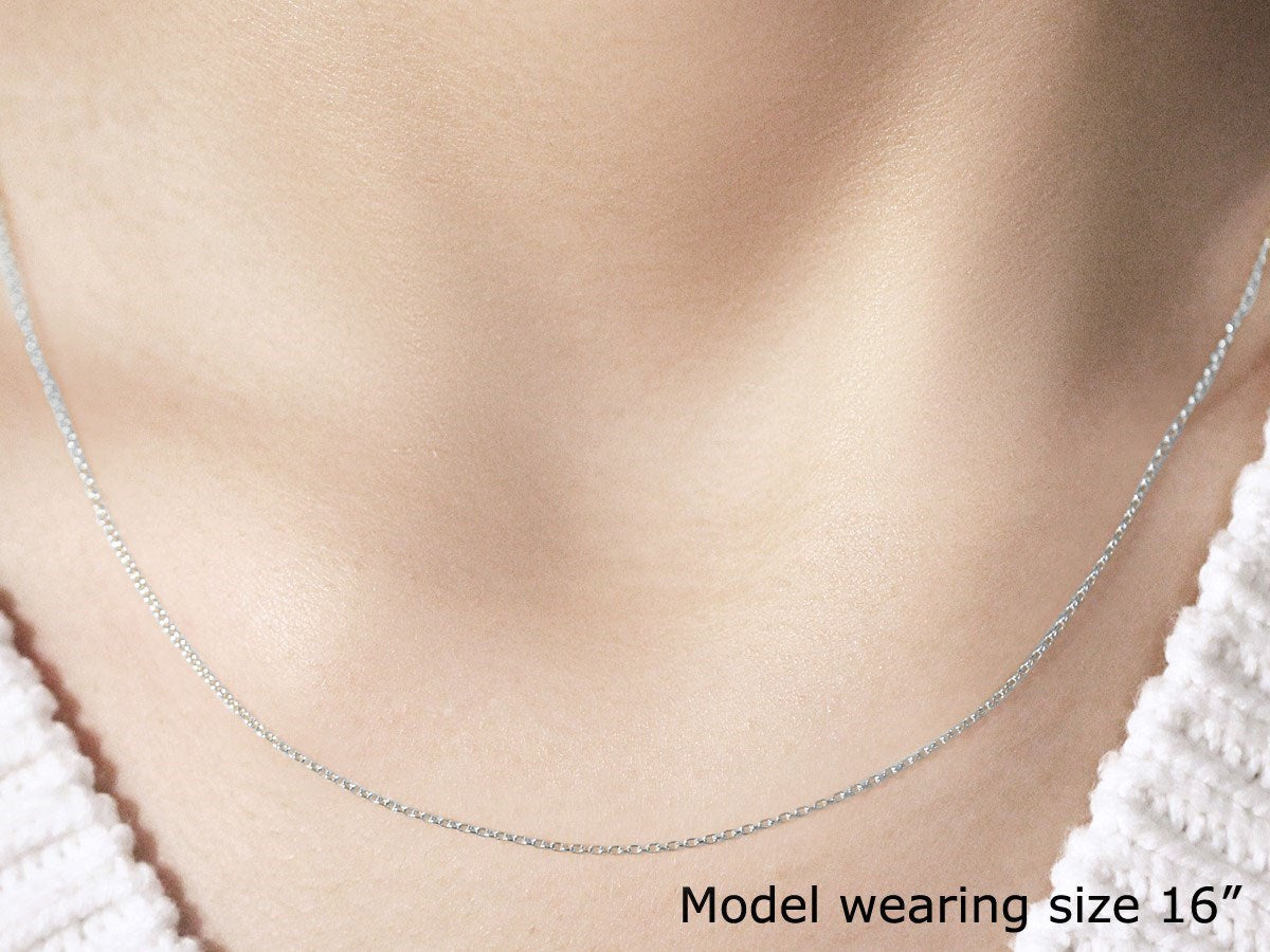 Peelerie jewelry piece in midnight luxury editorial product photo, high-contrast studio lighting