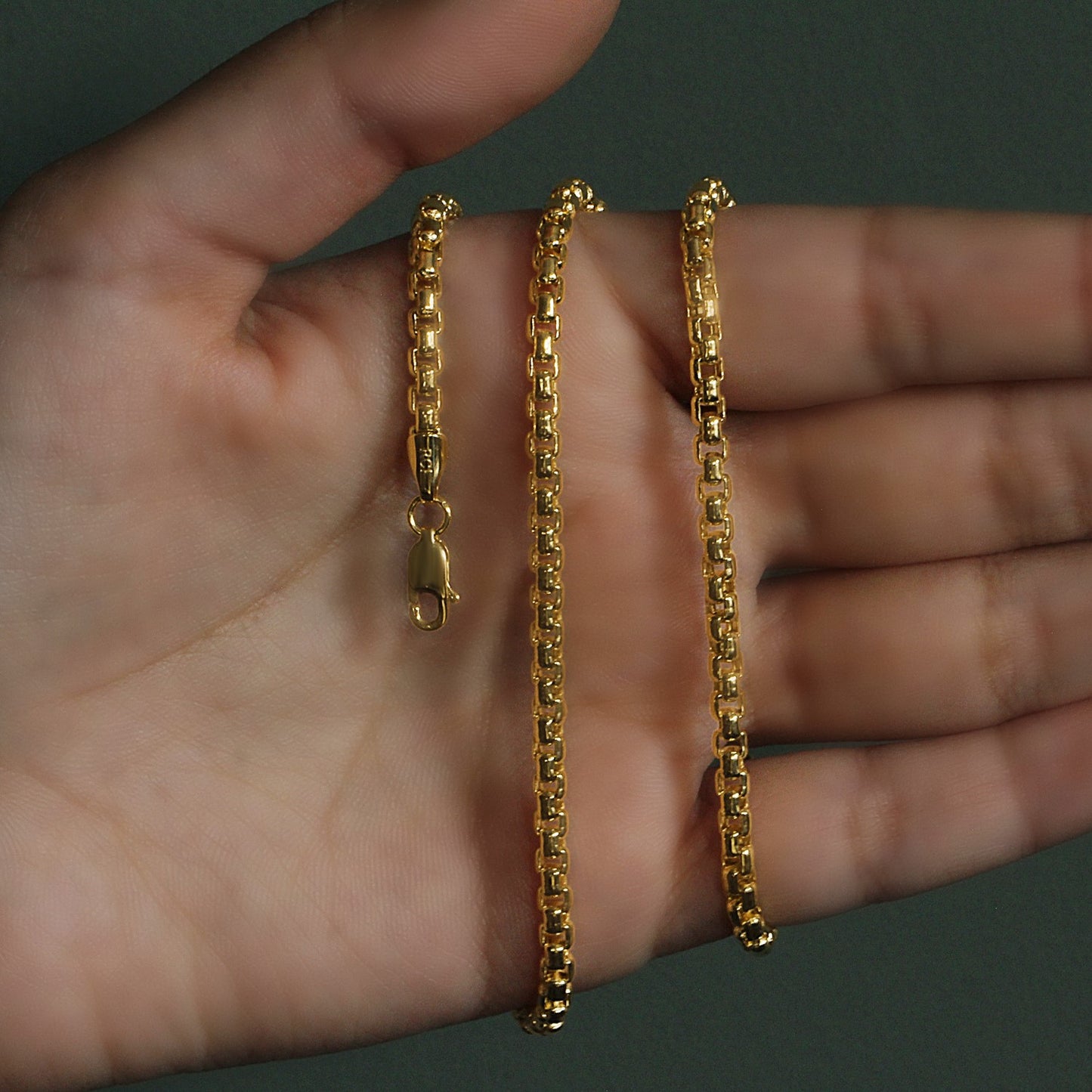 Peelerie jewelry piece in midnight luxury editorial product photo, high-contrast studio lighting