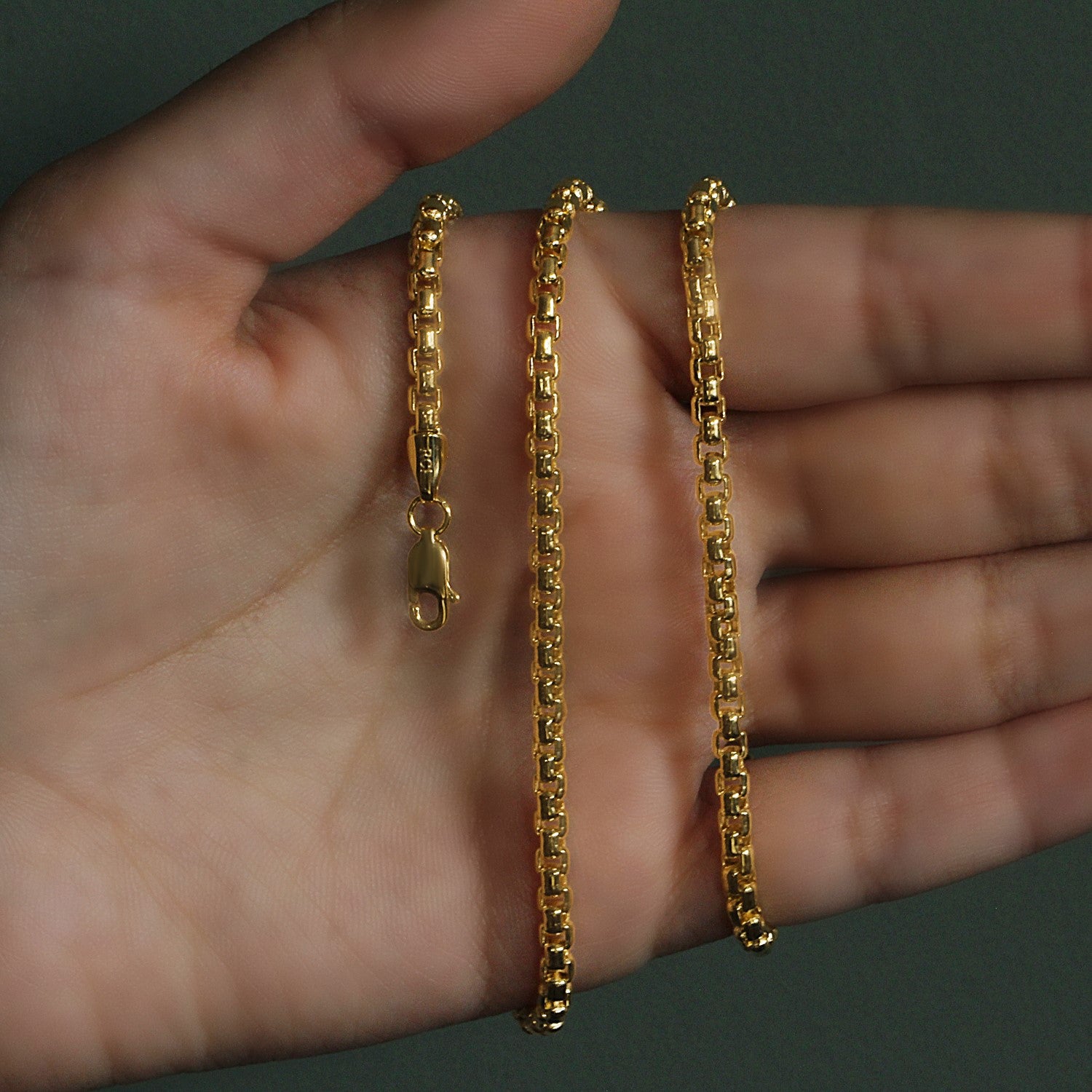 Peelerie jewelry piece in midnight luxury editorial product photo, high-contrast studio lighting