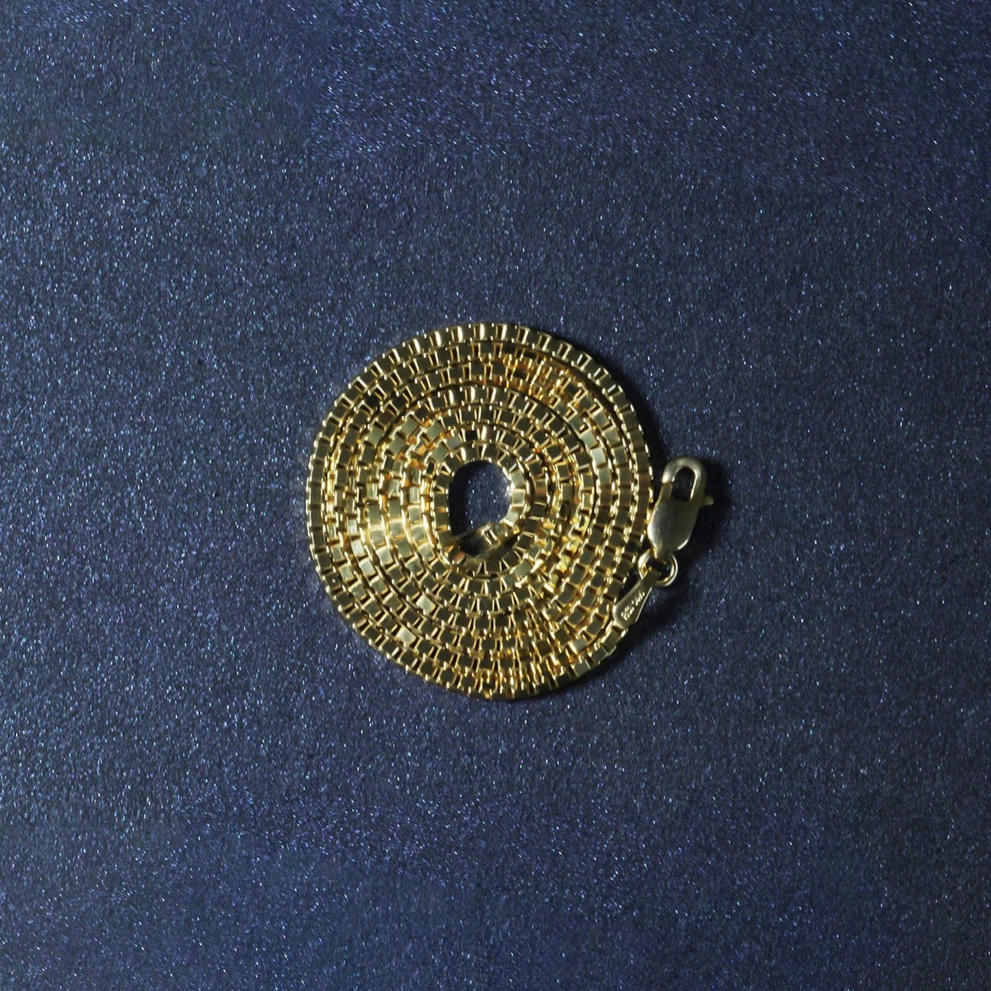 Peelerie jewelry piece in midnight luxury editorial product photo, high-contrast studio lighting