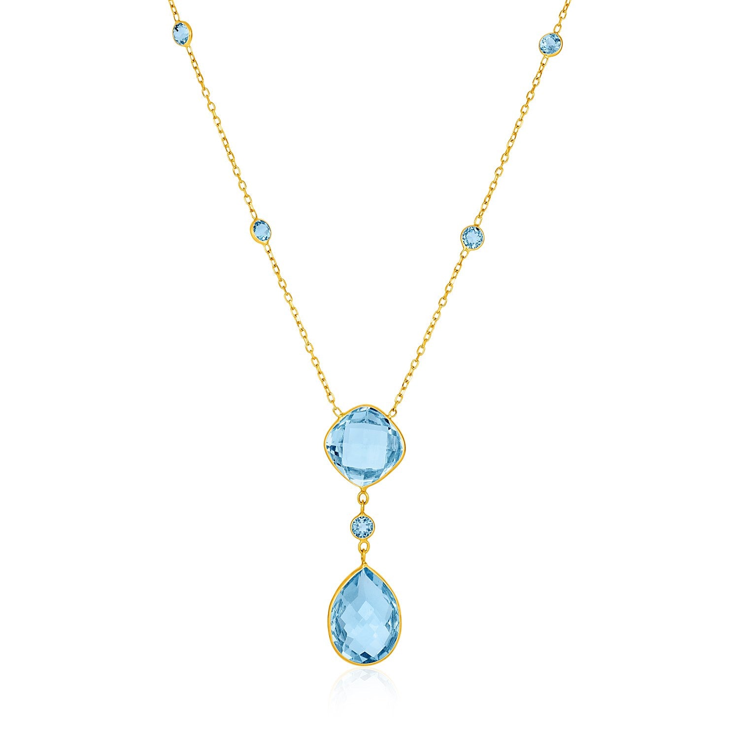 14k Yellow Gold Necklace with Pear-Shaped and Cushion Blue Topaz Briolettes in a sleek high-contrast midnight luxury editoria