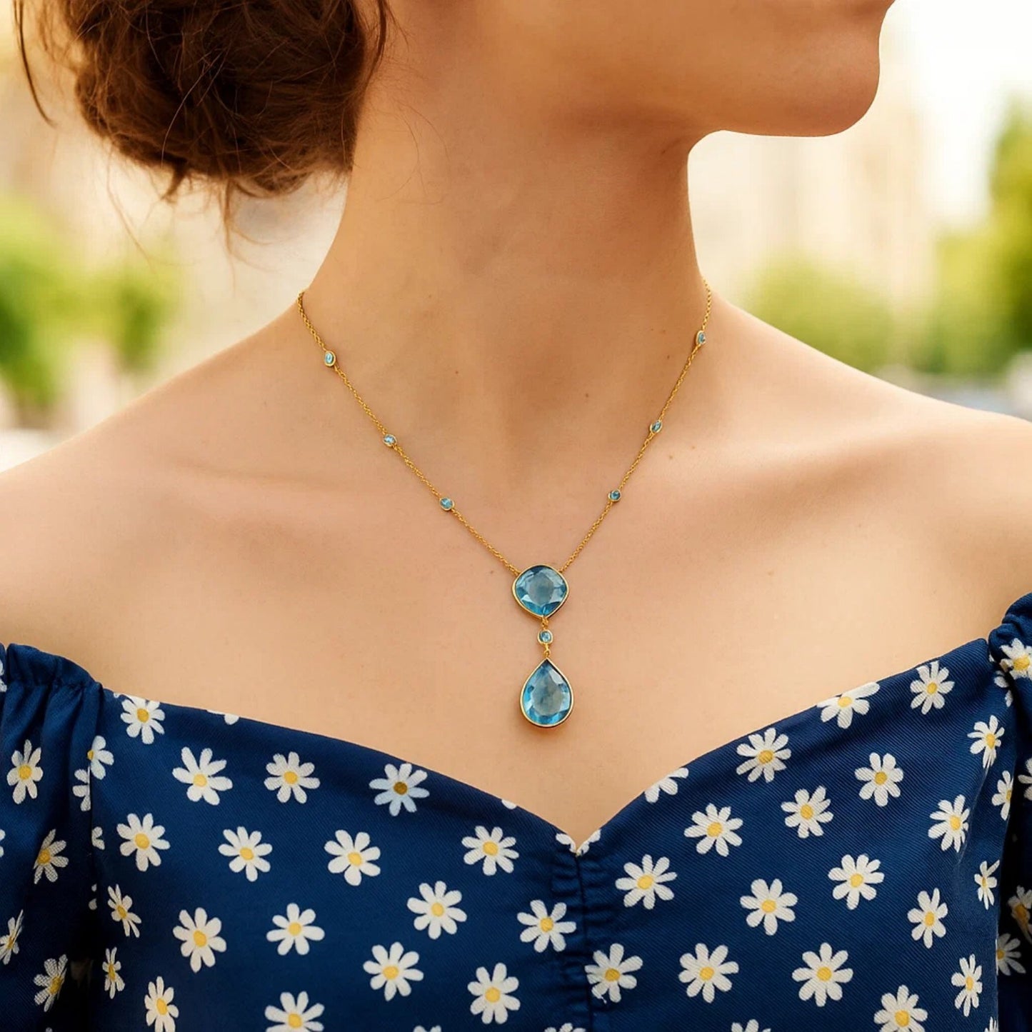 14k Yellow Gold Necklace with Pear-Shaped and Cushion Blue Topaz Briolettes