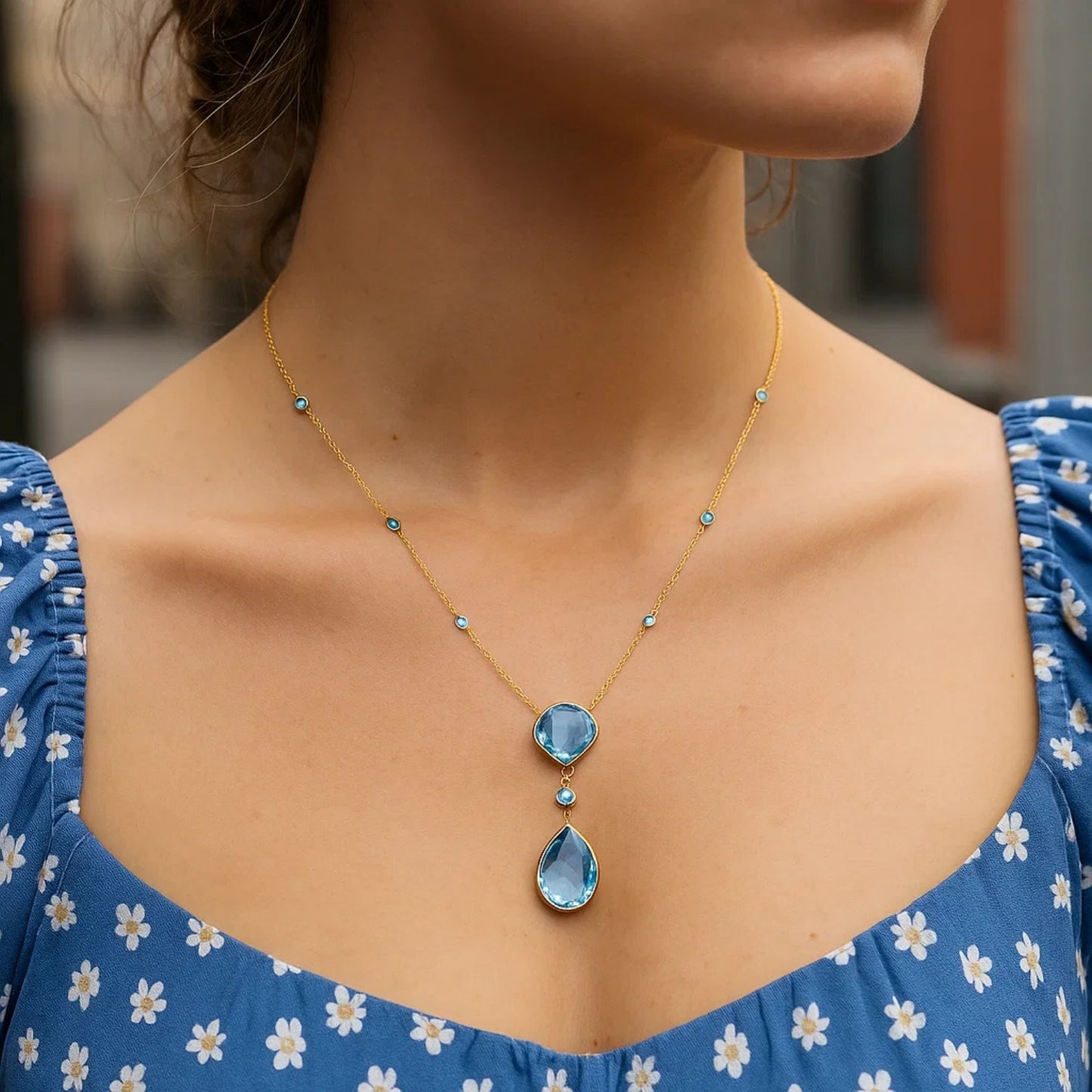 14k Yellow Gold Necklace with Pear-Shaped and Cushion Blue Topaz Briolettes