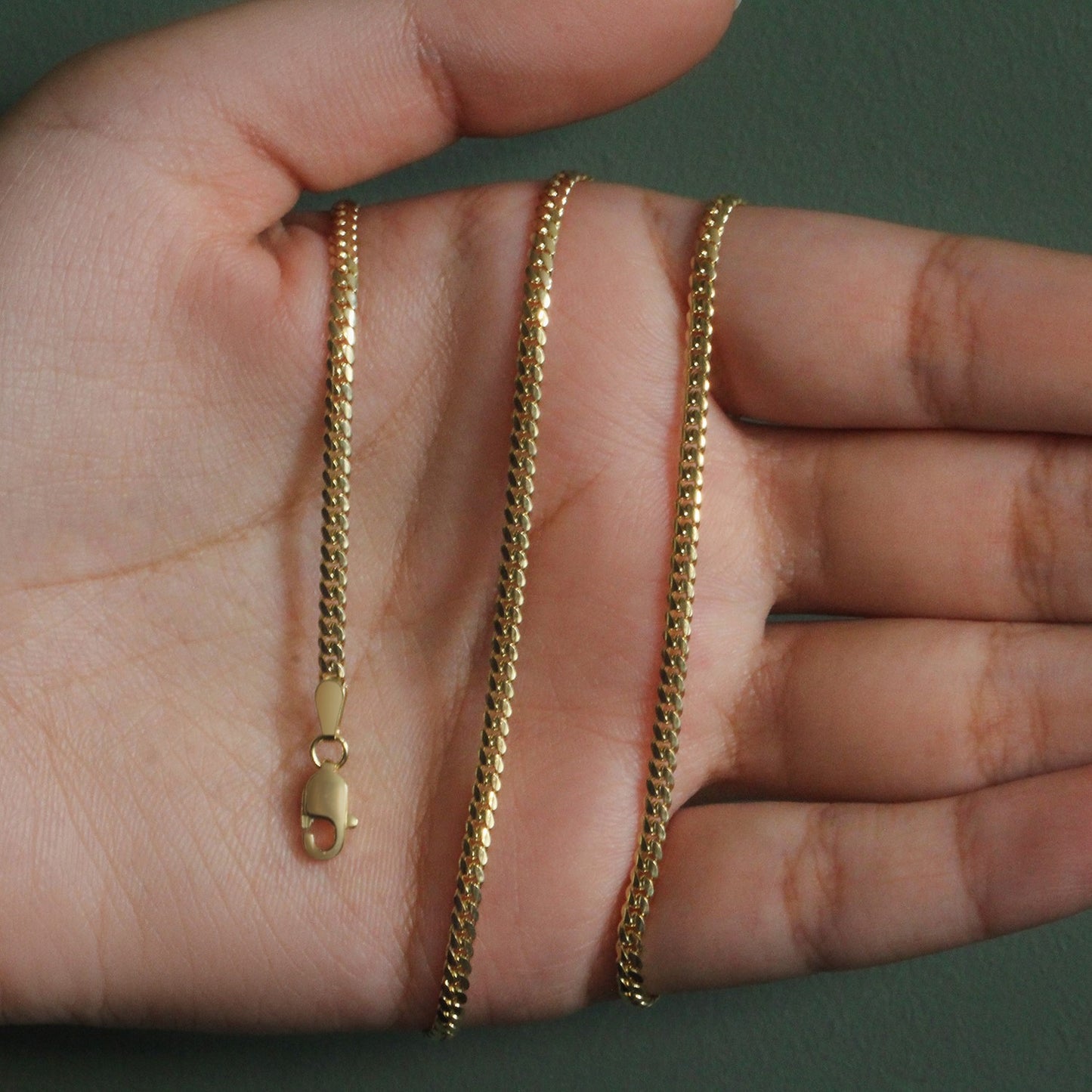 Peelerie jewelry piece in midnight luxury editorial product photo, high-contrast studio lighting