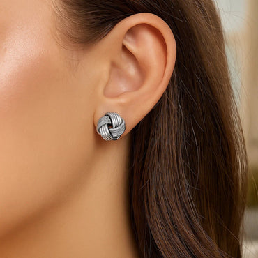 Peelerie jewelry piece in midnight luxury editorial product photo, high-contrast studio lighting