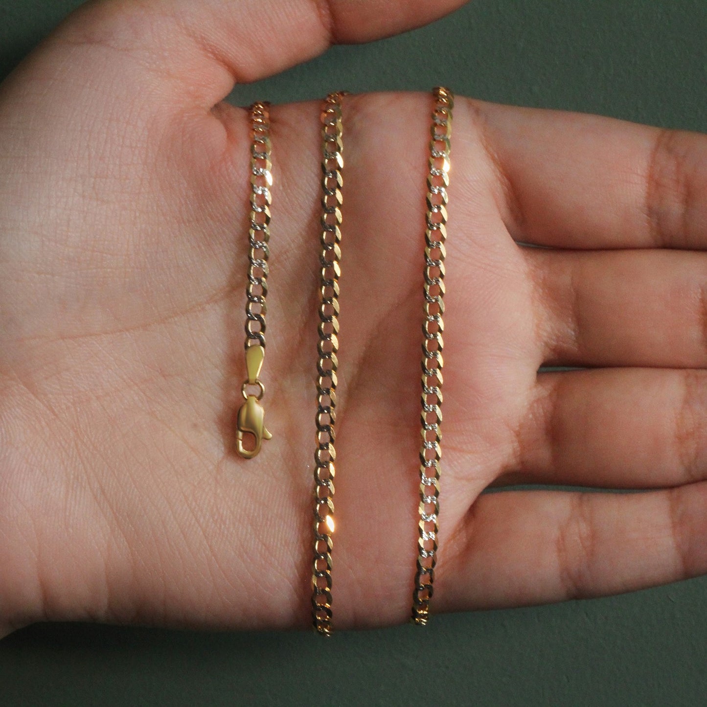 Peelerie jewelry piece in midnight luxury editorial product photo, high-contrast studio lighting