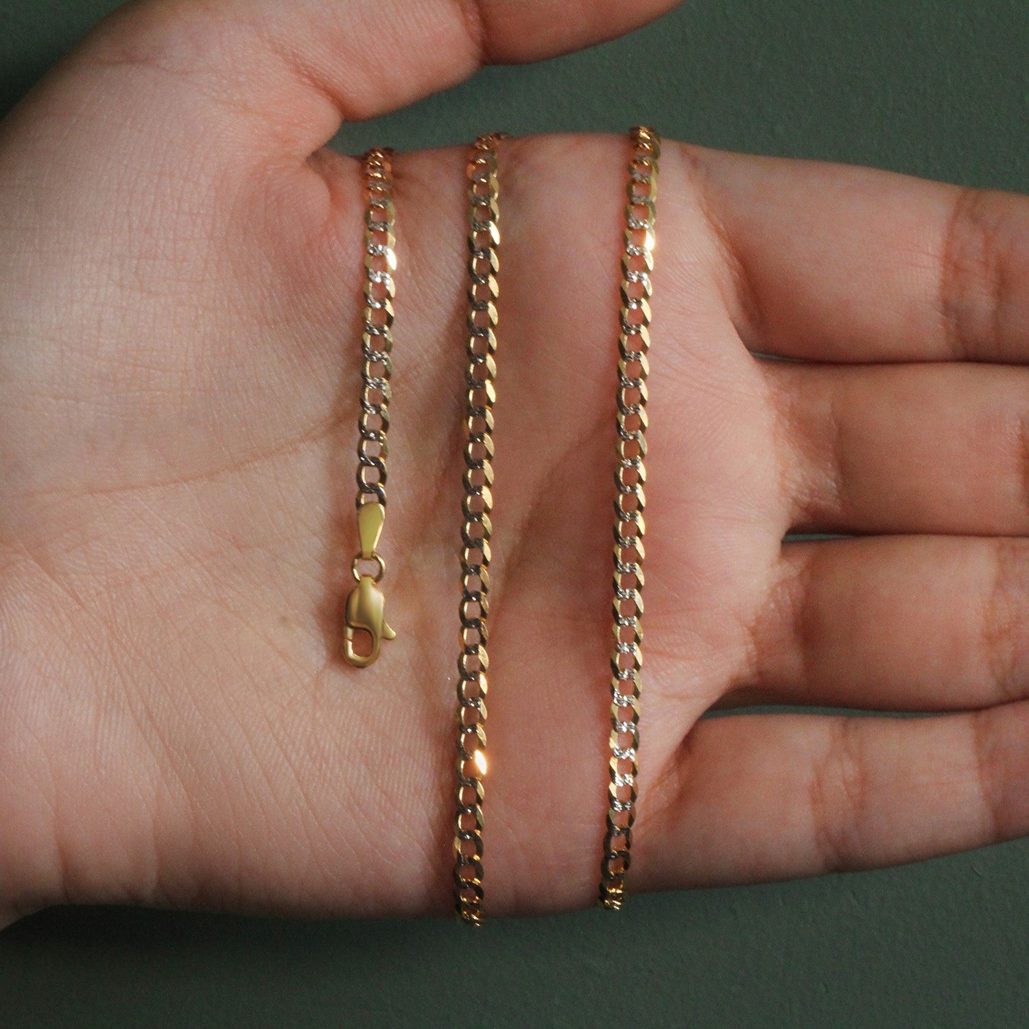 Peelerie jewelry piece in midnight luxury editorial product photo, high-contrast studio lighting