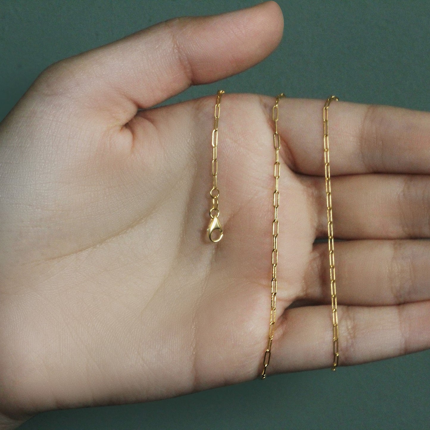 Peelerie jewelry piece in midnight luxury editorial product photo, high-contrast studio lighting