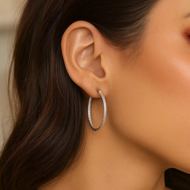 Peelerie jewelry piece in midnight luxury editorial product photo, high-contrast studio lighting