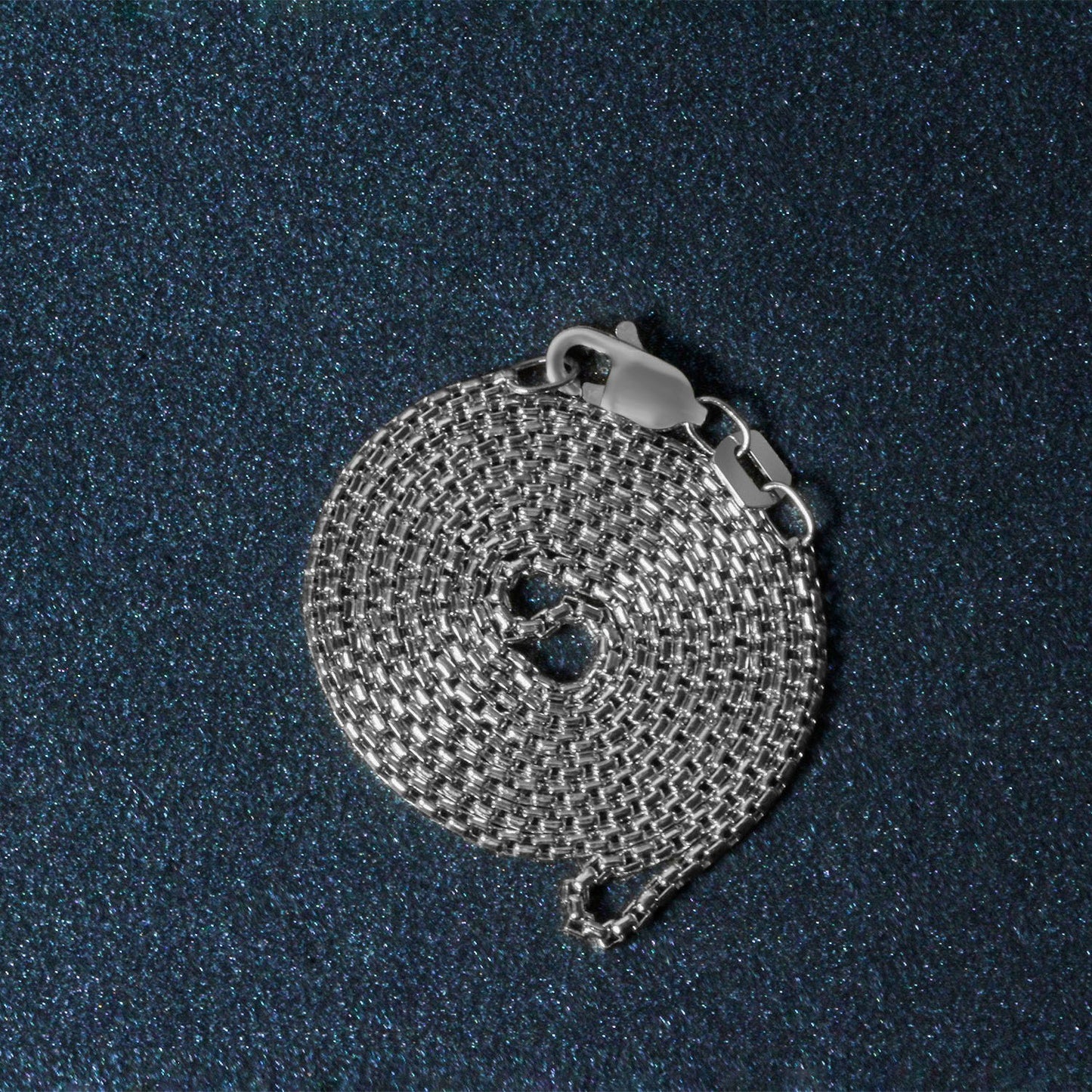 Peelerie jewelry piece in midnight luxury editorial product photo, high-contrast studio lighting