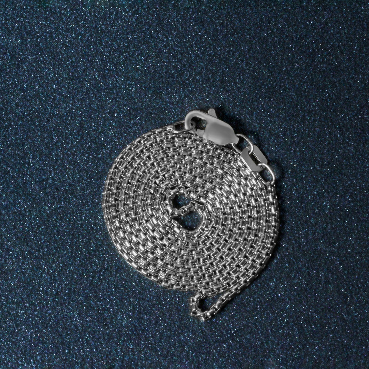 Peelerie jewelry piece in midnight luxury editorial product photo, high-contrast studio lighting